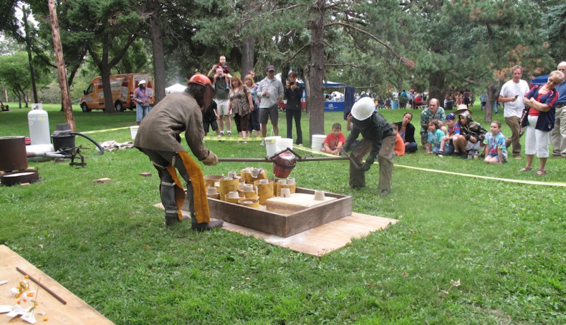 Pouring aluminum into the molds.