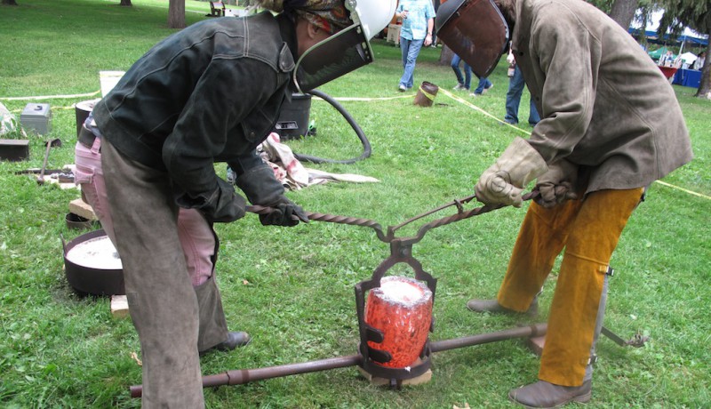 Releasing the crucible from the tongs.
